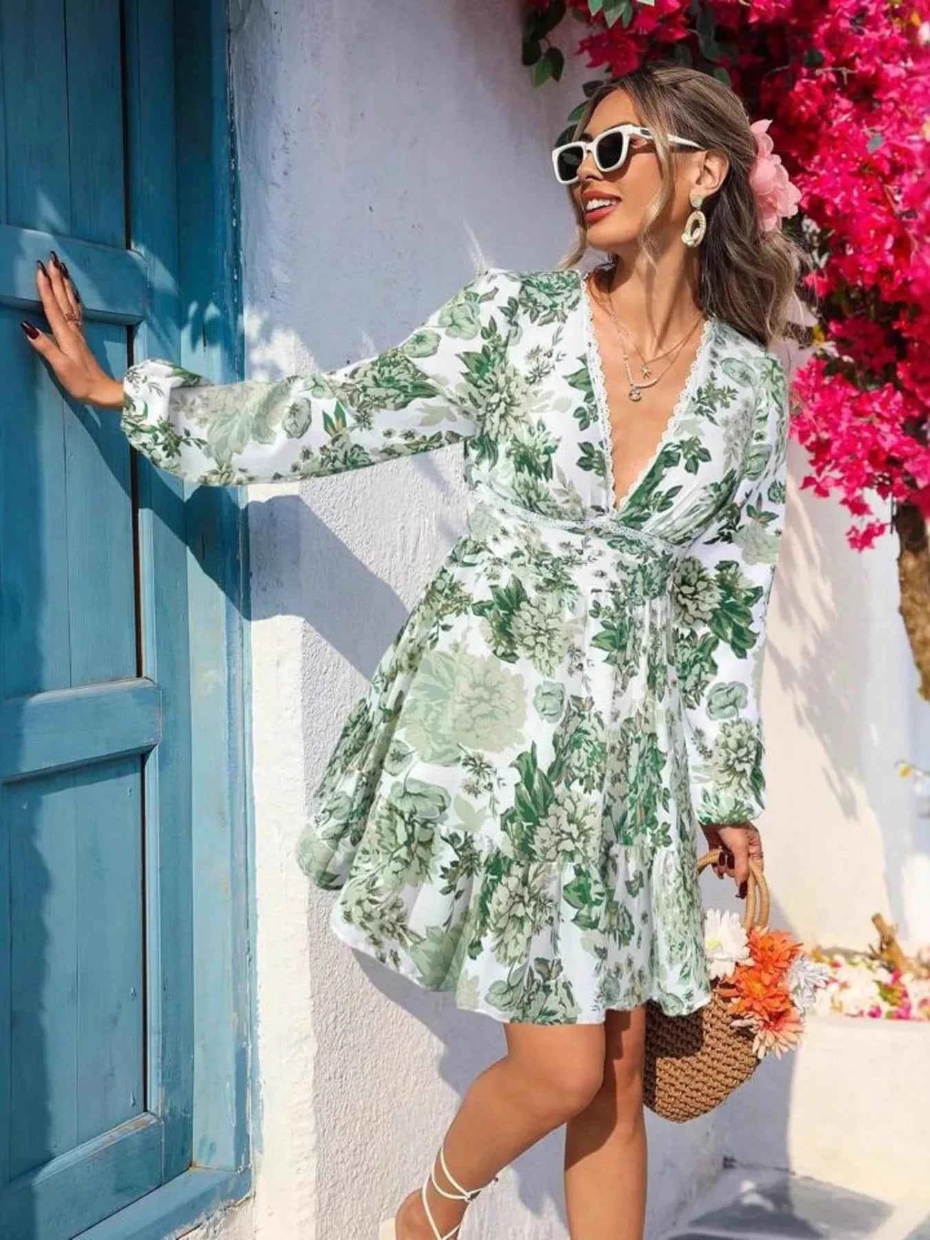 Full Size Floral Print V-Neck Long Sleeve Ruffle Hem Mini Dress Plus Size