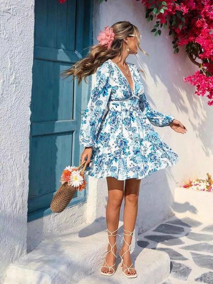Full Size Floral Print V-Neck Long Sleeve Ruffle Hem Mini Dress Plus Size