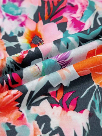 Floral 3/4 Flare Sleeve Tied Neck Blouse