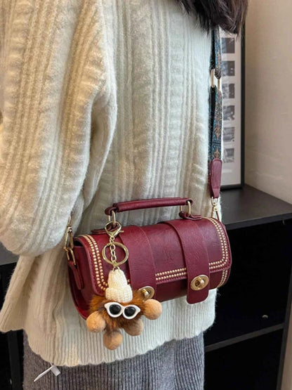 Vintage Barrel Crossbody Bag with Charm